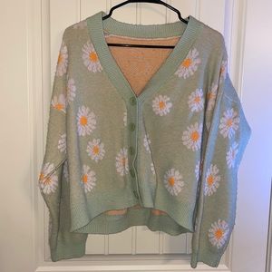 Oversized green daisy sweater with buttons